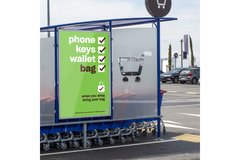 Image signage suggesting consumers should bring their own bags to retail shops